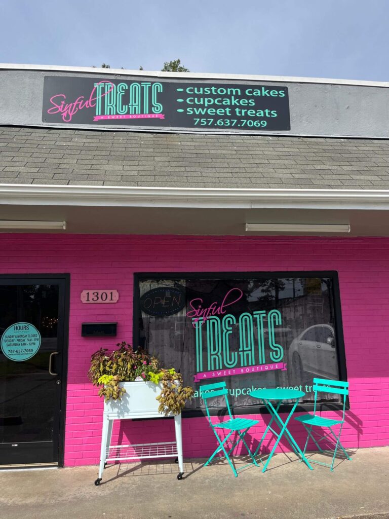 bright pink storefront of Sinful Treats bakery in Hampton